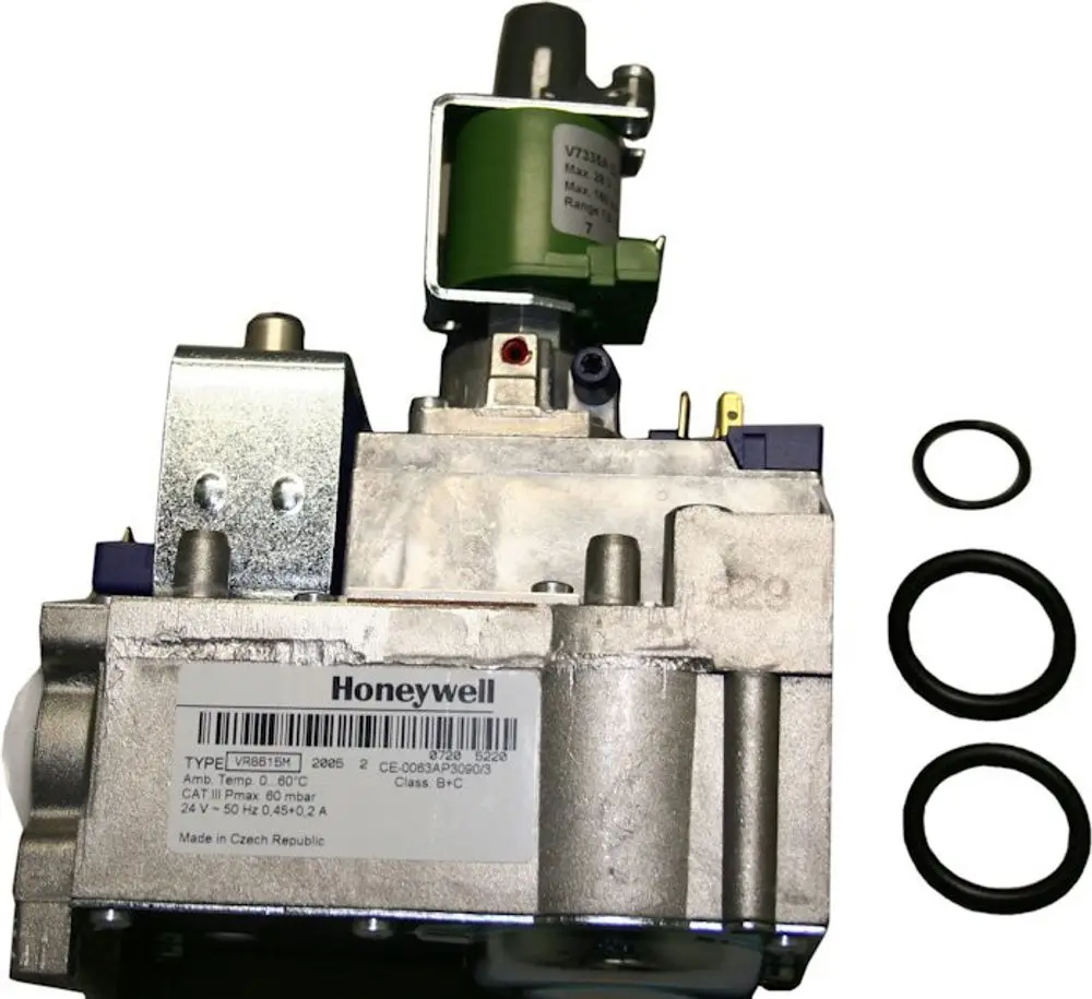 Bosch Gasarmatur mit Metallgehäuse, mehreren Anschlüssen, grüner Komponente und Gummi-Dichtungen. Sichtbare Beschriftung mit technischen Angaben auf dem Gehäuse.